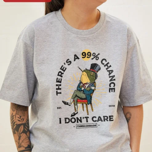 Customer in Chicago, Illinois wearing There's A 99% Chance I Don't Care Sarcastic Frog Graphic Tee Retro Cartoon Humor Shirt for Introvert