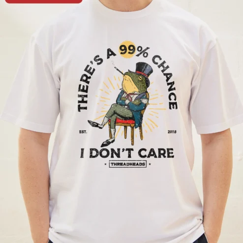Close-up of There's A 99% Chance I Don't Care Sarcastic Frog Graphic Tee Retro Cartoon Humor Shirt for Introvert for streetwear fans in Chicago, Illinois