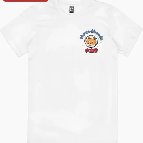 Threadheads Cosmic Shiba Inu Astronaut Doge Kawaii Graphic Tee on a hanger, ready to ship from Chicago, Illinois