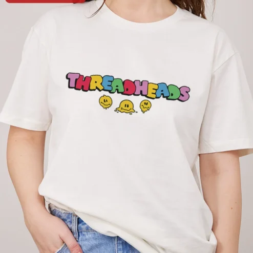 Threadheads Graphic Tee Oversized Streetwear Y2K Melting Smiley Face Shirt on a hanger, ready to ship from Chicago, Illinois