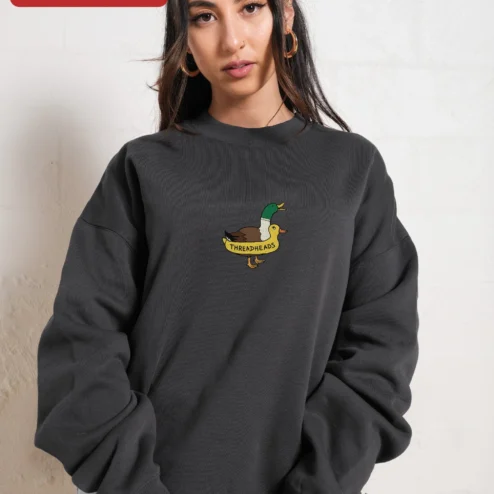 Customer in Chicago, Illinois wearing THREADHEADS Sweatshirt Black Crewneck Embroidered Two Headed Duck Streetwear Pullover