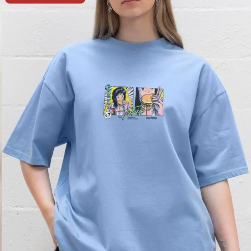 Customer in Chicago, Illinois wearing Tinykol First Humanoid Eating a Burger Retro Anime Tee