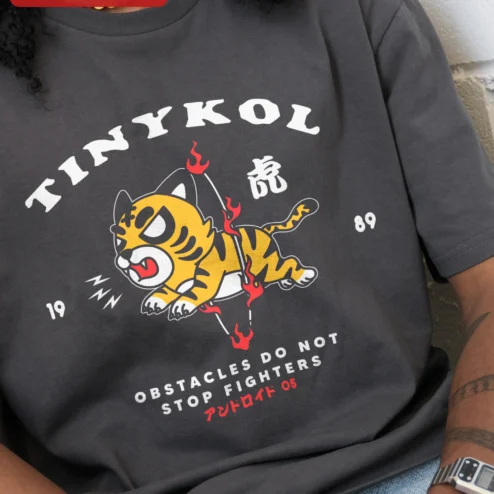 TINYKOL Obstacles Do Not Stop Fighters Tiger Graphic Tee Men Motivational Streetwear Shirt on a hanger, ready to ship from Chicago, Illinois