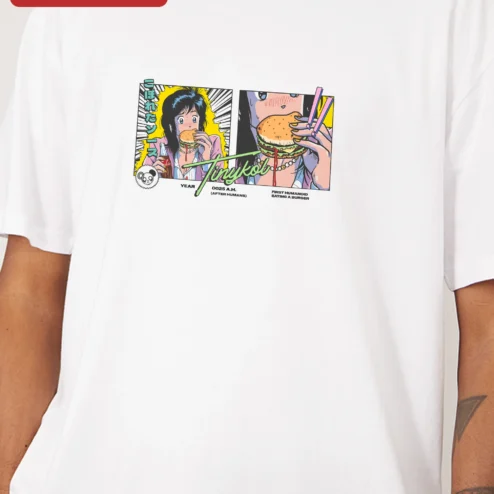 Close-up of Tinykol Year A.H. First Humanoid Eating Burger Graphic Tee Retro Anime Sci-Fi Humor Shirt for streetwear fans in Chicago, Illinois
