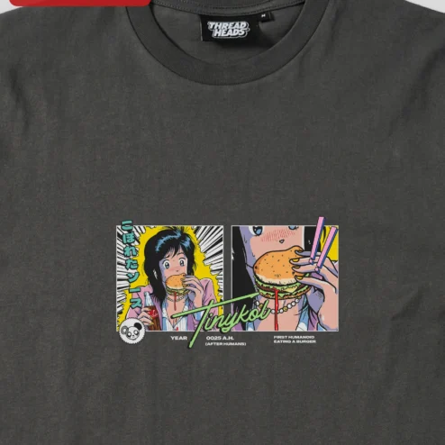 Tinykol Year A.H. First Humanoid Eating Burger Graphic Tee Retro Anime Sci-Fi Humor Shirt