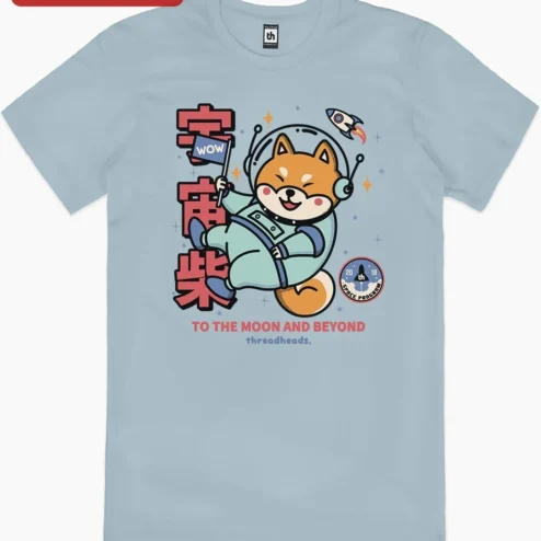 Customer in Chicago, Illinois wearing To The Moon And Beyond Cosmic Shiba Inu Astronaut Dog Graphic Tee