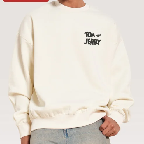 Customer in Chicago, Illinois wearing Tom and Jerry Sweatshirt Vintage Cartoon Crewneck for Women Men Gift