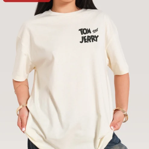 Customer in Chicago, Illinois wearing Tom and Jerry Tee Classic Cartoon Character Graphic T-Shirt Retro Animation Merch Gift for Fans