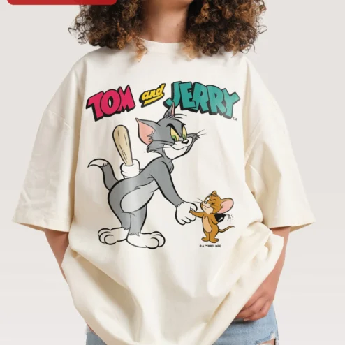 Customer in Chicago, Illinois wearing Tom and Jerry Tee Vintage Cartoon Double Trouble Duo Oversized Black T-Shirt for Adults