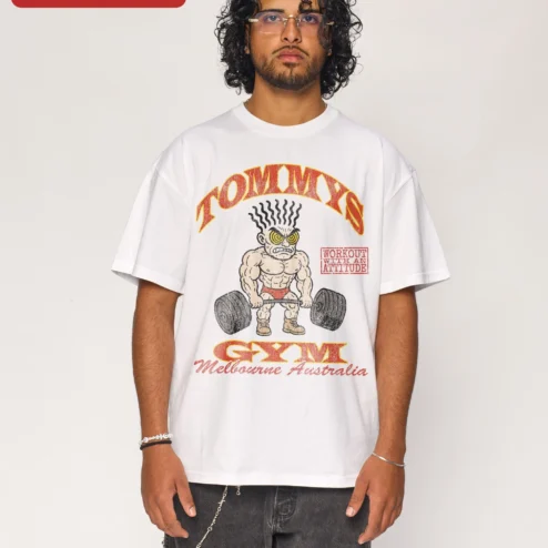 Close-up of TOMMYS GYM Stay Strong Stay Anabolic Tee Retro Bodybuilding Gym Apparel for streetwear fans in Chicago, Illinois