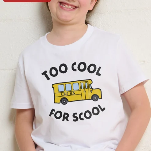 Customer in Chicago, Illinois wearing Too Cool For Scool Tee Back To School Graphic Shirt For Kids