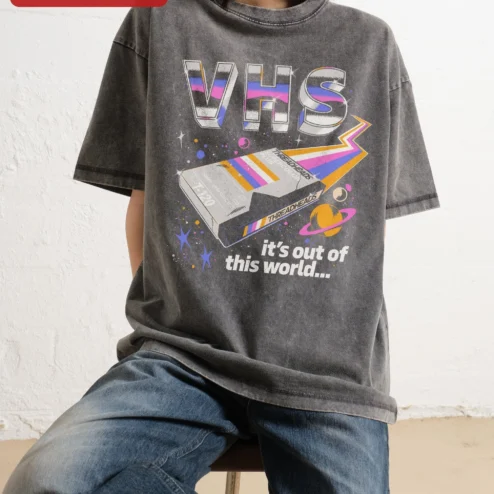 VHS It's Out of This World Retro Sci-Fi Graphic Tee for Men Women on a hanger, ready to ship from Chicago, Illinois