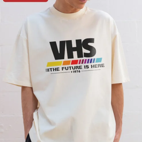 Customer in Chicago, Illinois wearing VHS The Future Is Here 1976 Retro Graphic Tee