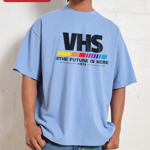 Close-up of VHS The Future Is Here 1976 Retro Graphic Tee for streetwear fans in Chicago, Illinois
