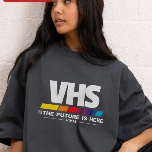 Close-up of VHS The Future Is Here 1976 Retro Tech Graphic Tee for streetwear fans in Chicago, Illinois