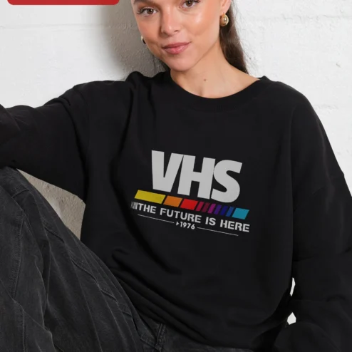Close-up of VHS The Future Is Here 1976 Retro Vaporwave Aesthetic Sweatshirt for streetwear fans in Chicago, Illinois