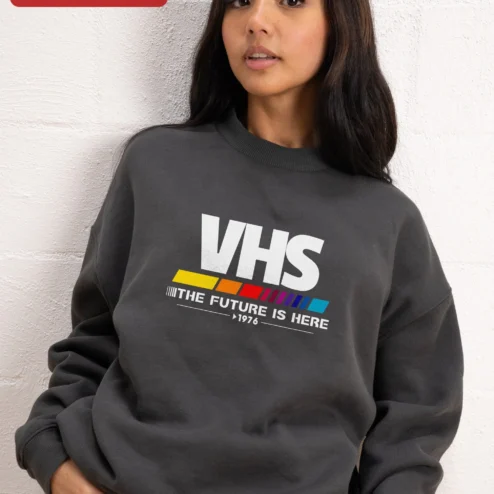 Customer in Chicago, Illinois wearing VHS The Future Is Here 1976 Retro Vaporwave Aesthetic Sweatshirt