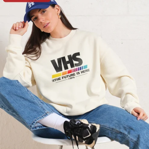 VHS The Future Is Here Retro Sweatshirt 1976 Analog Tech Nostalgia Gift on a hanger, ready to ship from Chicago, Illinois