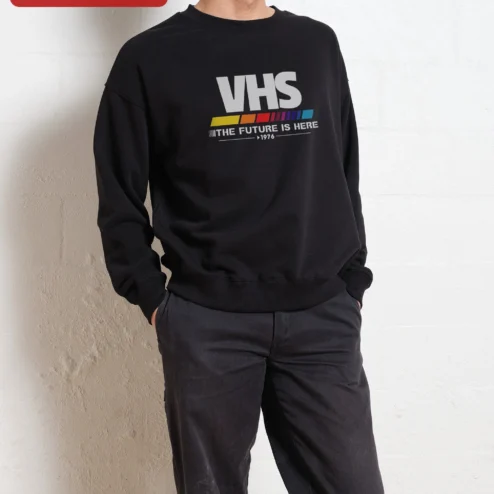 Customer in Chicago, Illinois wearing VHS The Future Is Here Retro Sweatshirt 1976 Analog Tech Nostalgia Gift