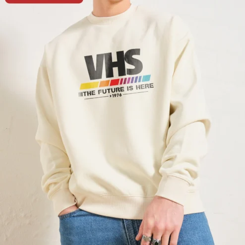 Close-up of VHS The Future Is Here Retro Sweatshirt 1976 Analog Tech Nostalgia Gift for streetwear fans in Chicago, Illinois