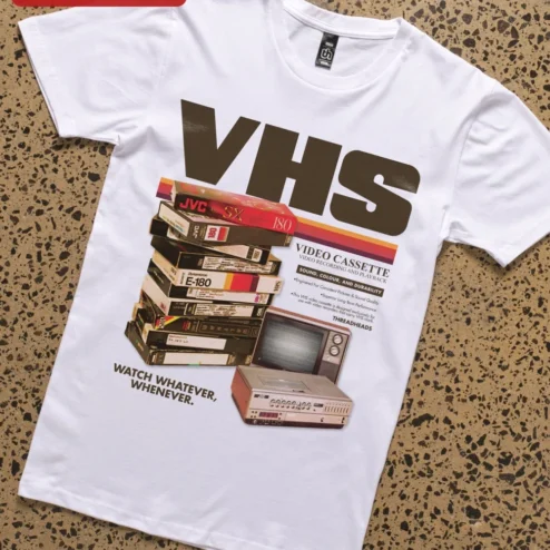 VHS Vintage Tape Retro Nostalgia Graphic Tee for Men Women Unisex Cotton Shirt on a hanger, ready to ship from Chicago, Illinois