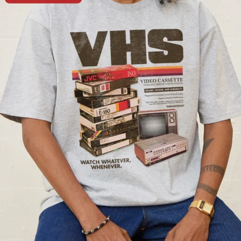 Customer in Chicago, Illinois wearing VHS Vintage Tape Retro Nostalgia Graphic Tee for Men Women Unisex Cotton Shirt