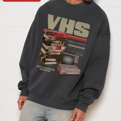 Customer in Chicago, Illinois wearing VHS Watch Whatever Whenever Retro Nostalgia Sweatshirt