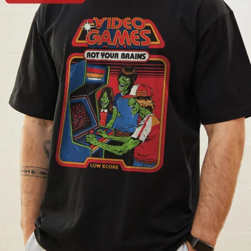 Customer in Chicago, Illinois wearing Video Games Rot Your Brains Tee Retro Zombie Arcade Gamer Humor Shirt