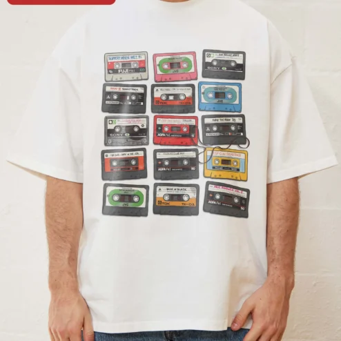 Vintage Cassette Tape Grid Pattern Tee Retro Mixtape Collection Graphic Shirt for Music Lovers on a hanger, ready to ship from Chicago, Illinois