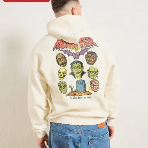 Close-up of Vintage Horror Monster Mash Pullover Hoodie Vampire Werewolf Skull Graphic for streetwear fans in Chicago, Illinois
