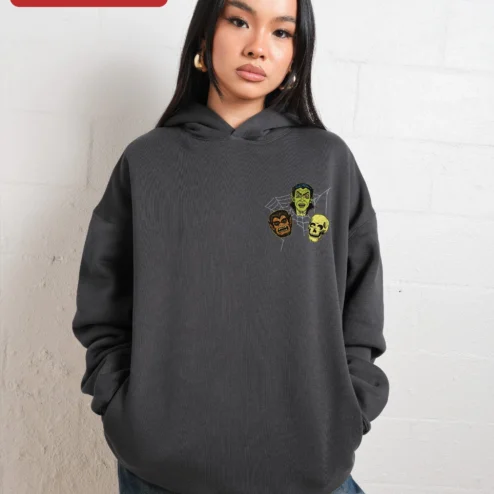 Customer in Chicago, Illinois wearing Vintage Horror Monster Mash Pullover Hoodie Vampire Werewolf Skull Graphic