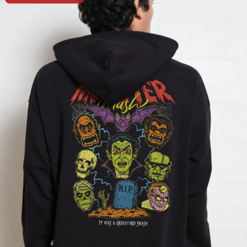 Close-up of Vintage Horror Monster Mash Pullover Hoodie Vampire Werewolf Skull Graphic for streetwear fans in Chicago, Illinois