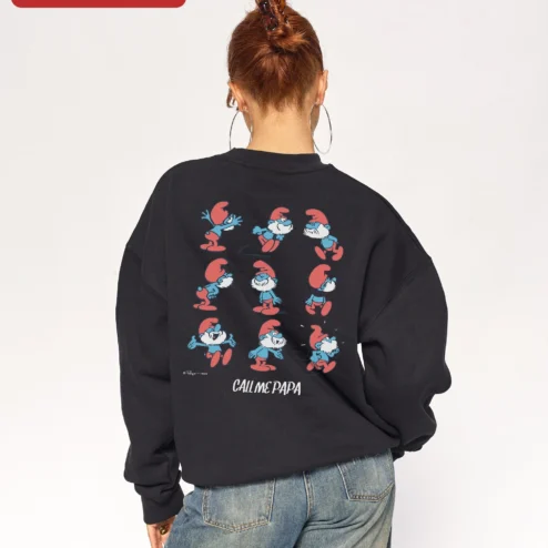 Close-up of Vintage Since 1928 The Smurfs Sweatshirt Retro Pop Culture Crewneck Gift for streetwear fans in Chicago, Illinois