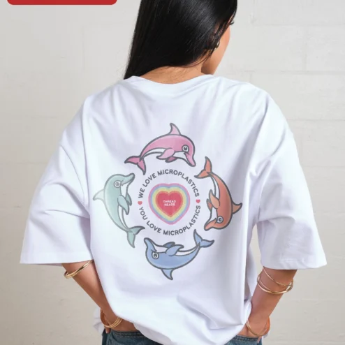 Close-up of We Love Microplastics Satirical Eco Awareness Tee Unisex Cotton Graphic Shirt for streetwear fans in Chicago, Illinois