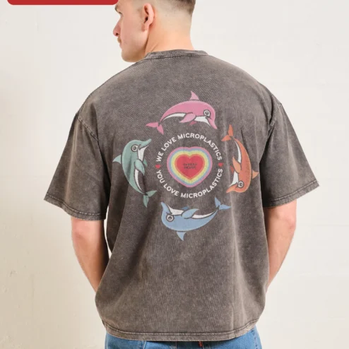 Close-up of We Love Microplastics You Love Microplastics Acid Wash Tee Funny Eco Meme Shirt for streetwear fans in Chicago, Illinois