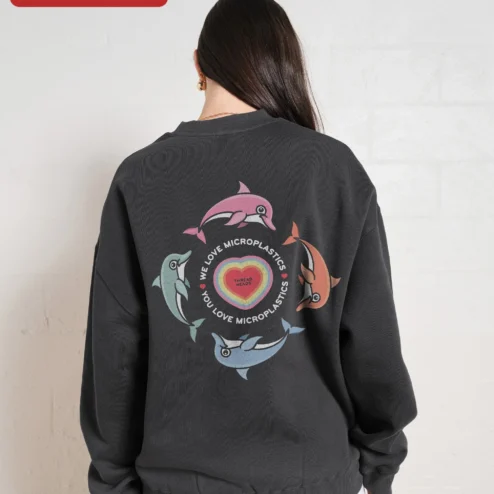 Customer in Chicago, Illinois wearing We Love Microplastics You Love Microplastics Funny Meme Sweatshirt Retro Dolphin Graphic Crewneck