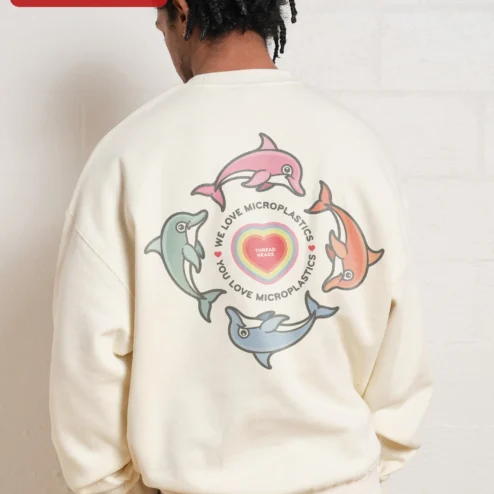 Customer in Chicago, Illinois wearing We Love Microplastics You Love Microplastics Funny Meme Sweatshirt Retro Dolphin Graphic Crewneck