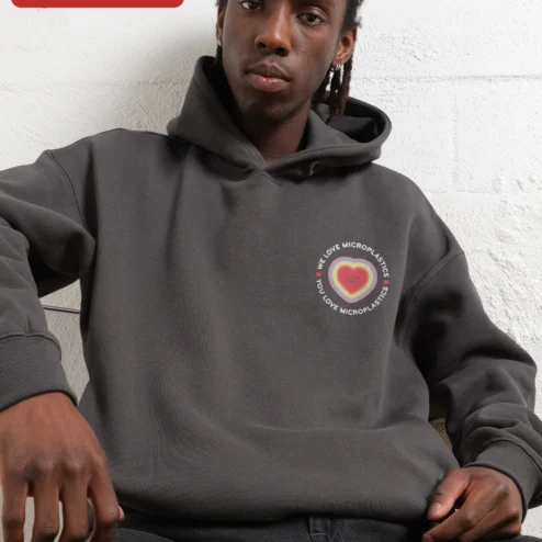 Customer in Chicago, Illinois wearing We Love Microplastics You Love Microplastics Sarcastic Environmental Hoodie