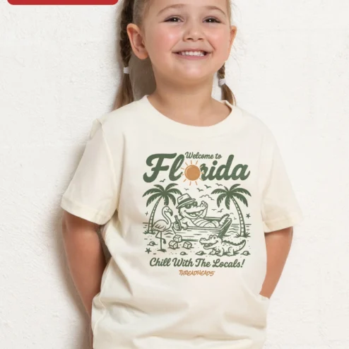 Welcome to Florida Chill With The Locals Kids Tee Funny Alligator Hammock Graphic Shirt on a hanger, ready to ship from Chicago, Illinois