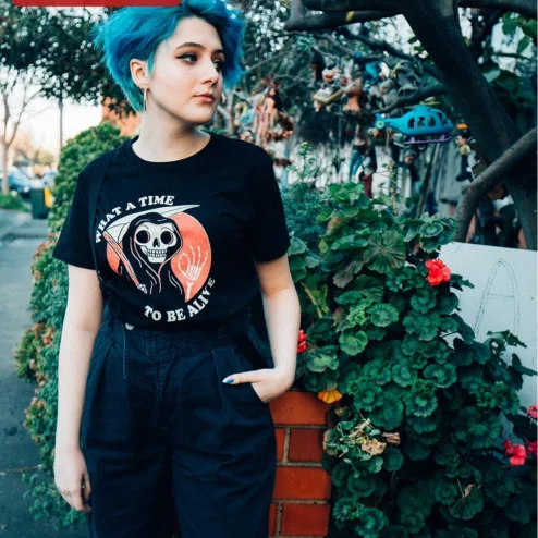 Customer in Chicago, Illinois wearing What A Time To Be Alive Grim Reaper Tee Vintage Horror Skeleton Graphic Shirt