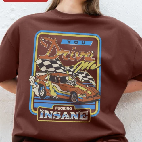 You Drive Me Fucking Insane Retro Muscle Car Burnout Graphic Tee on a hanger, ready to ship from Chicago, Illinois