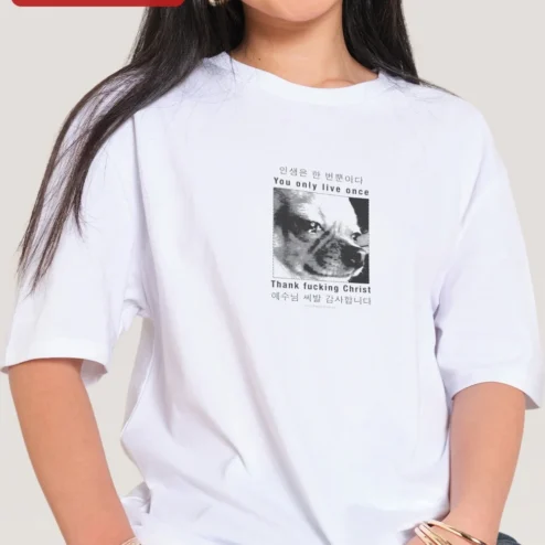 Close-up of You Only Live Once Thank F***ing Christ YOLO Dog Graphic Tee for streetwear fans in Chicago, Illinois