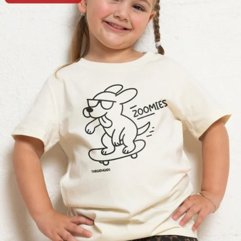 ZOOMIES Dog Skateboarding Graphic Tee Funny Pet Lover Gift Shirt on a hanger, ready to ship from Chicago, Illinois